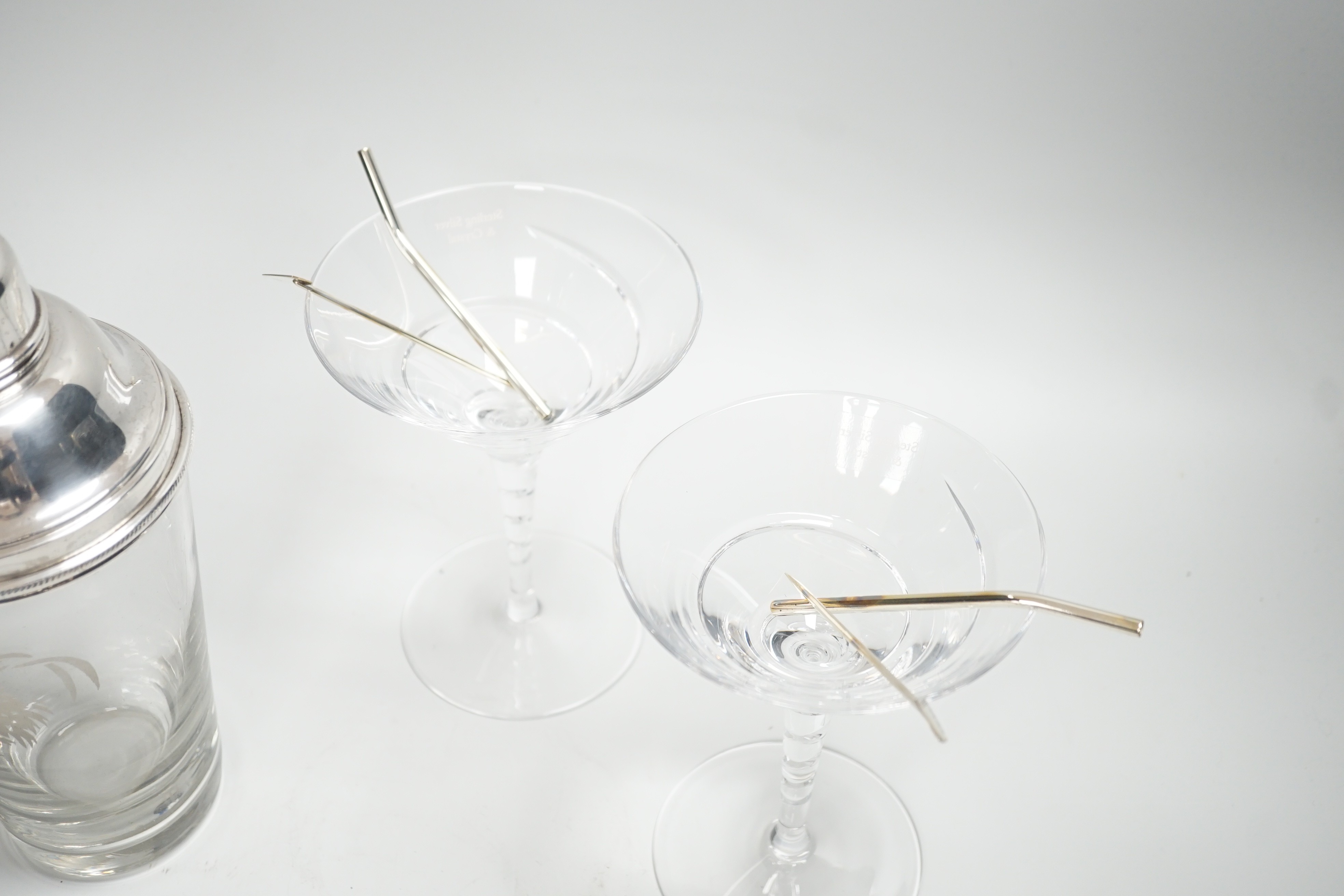 A silver plated cockerel cocktail shaker together with silver stirrers and glasses